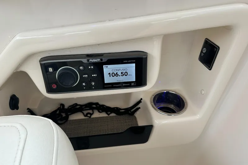  Yacht Photos Pics Fusion stereo system on 2018 Grady-White Freedom 285 boat dashboard.