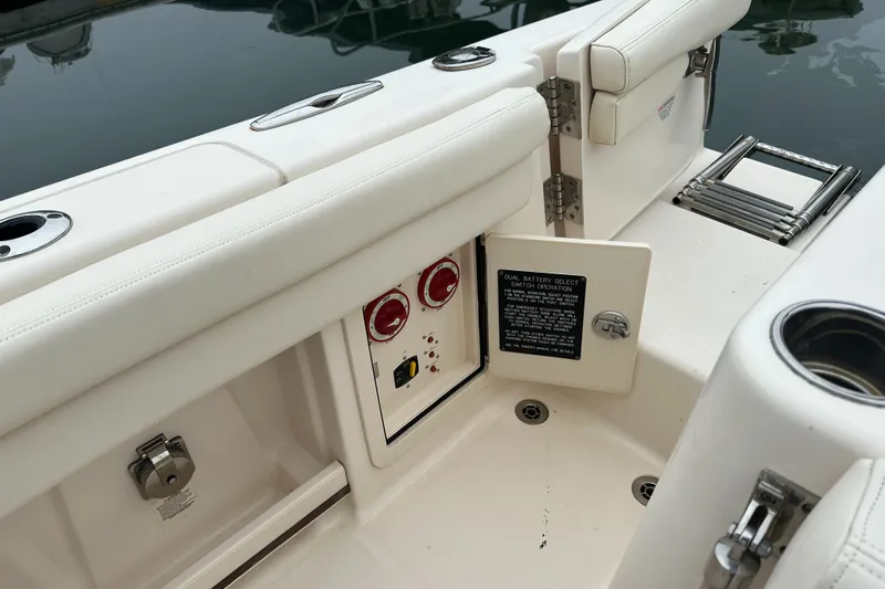  Yacht Photos Pics 2018 Grady-White Freedom 285 boat interior with control panel and seating.