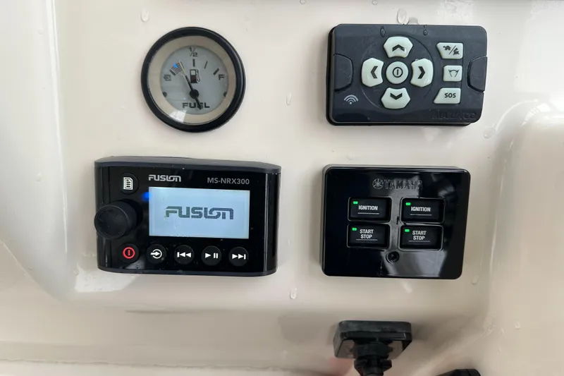  Yacht Photos Pics Control panel of 2018 Grady-White Freedom 285 boat with fuel gauge and audio system.