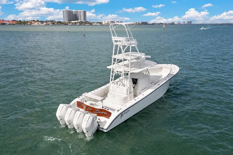  Yacht Photos Pics 2015 Yellowfin 39 Offshore boat on open water, clear sky, coastal background.
