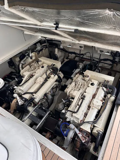  Yacht Photos Pics Engine compartment of a 2005 Sea Ray 44 Sundancer yacht, showcasing dual engines.