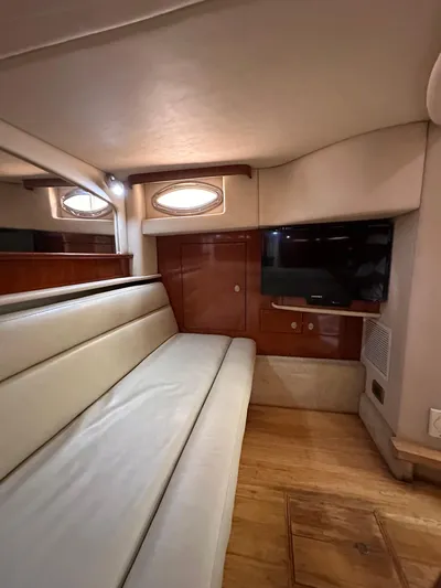  Yacht Photos Pics Interior of 2005 Sea Ray 44 Sundancer yacht with beige seating and wood accents.