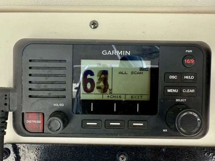 Reelaxing Yacht Photos Pics Garmin marine radio display on 2017 World Cat 295 CC boat, showing channel 64.