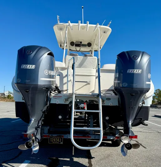 Reelaxing Yacht Photos Pics 2017 World Cat 295 CC boat with dual Yamaha 300 engines, rear view.