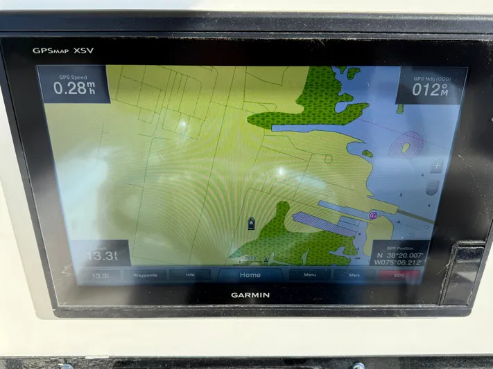 Reelaxing Yacht Photos Pics Garmin GPS display on 2017 World Cat 295 CC boat showing navigation map and coordinates.