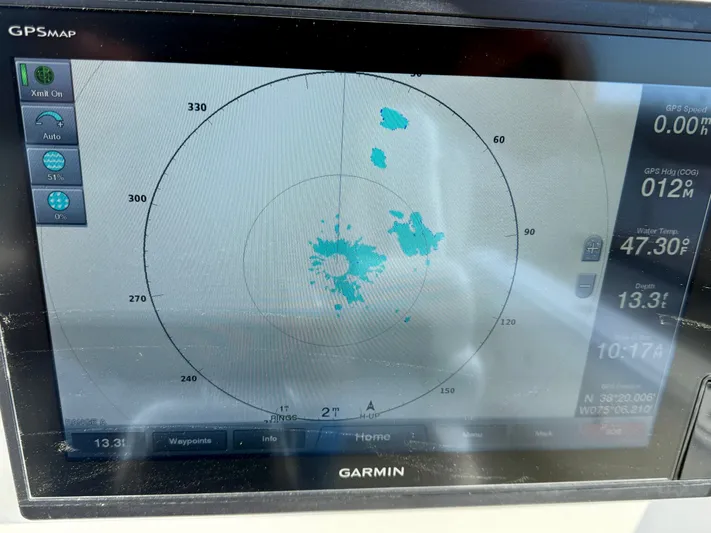 Reelaxing Yacht Photos Pics Garmin GPS display on 2017 World Cat 295 CC, showing radar and navigation data.
