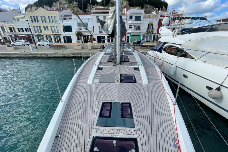  Yacht Photos Pics 2013 Hanse 575 yacht docked at a marina, showcasing sleek deck design.