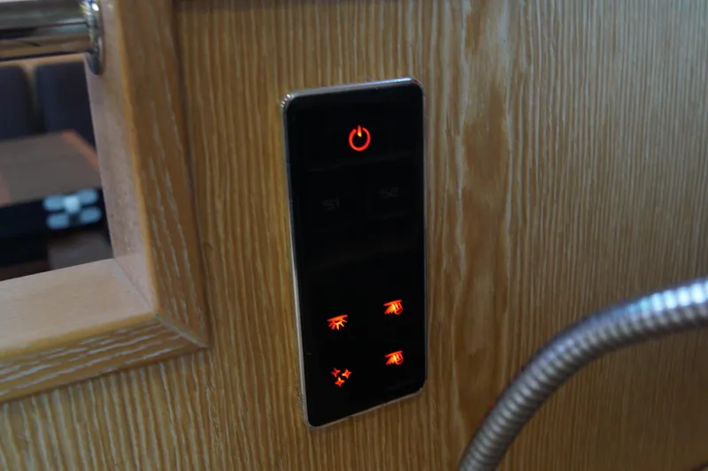  Yacht Photos Pics Control panel with illuminated buttons on 2013 Hanse 575 yacht interior.