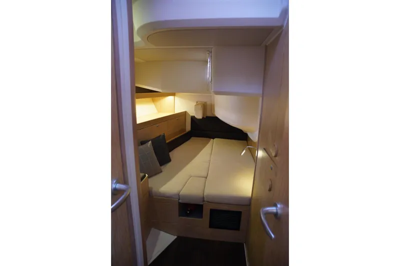  Yacht Photos Pics Cozy cabin interior of 2013 Hanse 575 yacht with modern furnishings.
