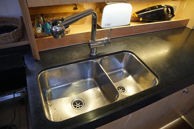  Yacht Photos Pics Stainless steel double sink in 2013 Hanse 575 yacht kitchen.