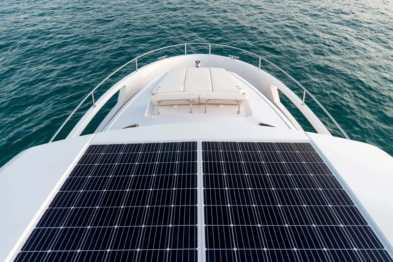  Yacht Photos Pics 2024 Greenline 45 Fly yacht with solar panels on deck, cruising on open water.