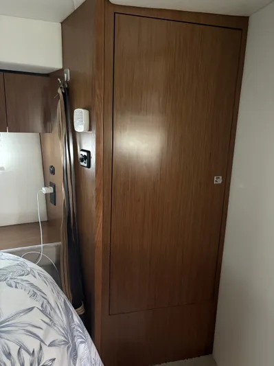 Jac & Wood Yacht Photos Pics Interior of 2017 Cruisers Yachts 380 Express, featuring wooden cabinetry and modern design elements.