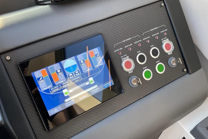  Yacht Photos Pics Control panel of 2023 Pershing 6X yacht with touchscreen and engine controls.