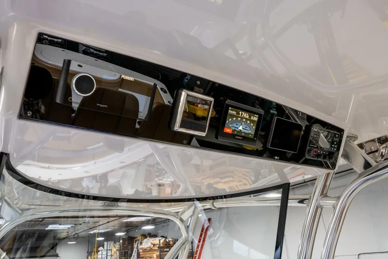 T/t Silvertime Yacht Photos Pics 2023 Valhalla Boatworks V-33 dashboard with modern navigation and control systems.