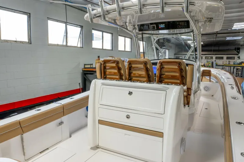 T/t Silvertime Yacht Photos Pics 2023 Valhalla Boatworks V-33 interior with sleek seating and modern design.