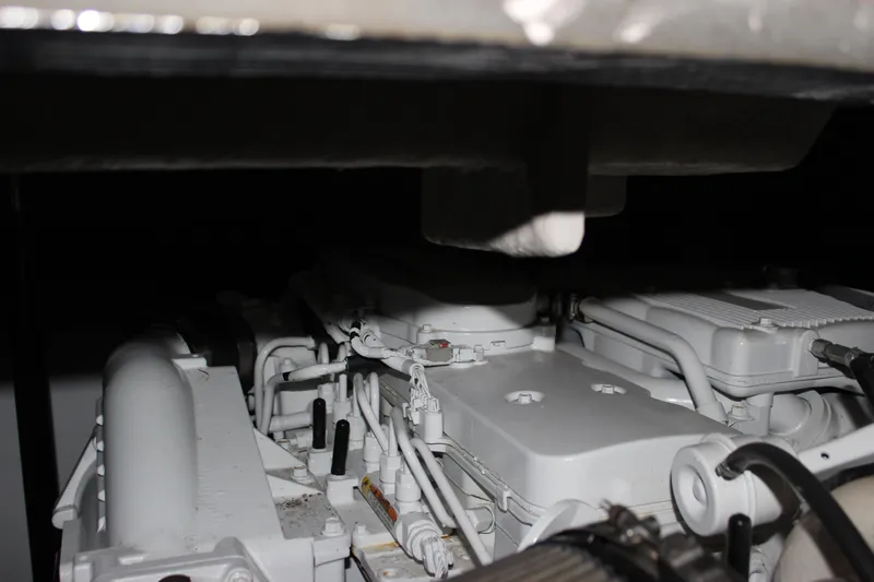  Yacht Photos Pics Engine compartment of a 2017 Sea Ray Sundancer 400 yacht, showcasing mechanical components.