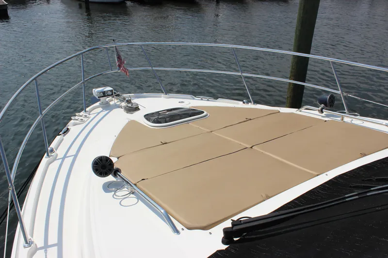  Yacht Photos Pics 2017 Sea Ray Sundancer 400 yacht with spacious sunbathing deck on calm water.