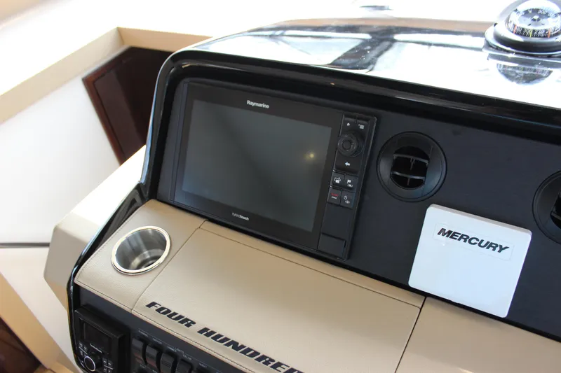  Yacht Photos Pics Control panel of 2017 Sea Ray Sundancer 400 with Raymarine display and Mercury system.