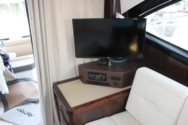  Yacht Photos Pics Interior of 2017 Sea Ray Sundancer 400 with TV and seating area.