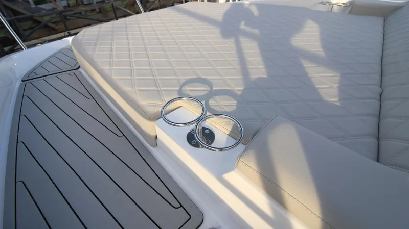  Yacht Photos Pics 2023 NX Boats 34 Sport Coupe, luxury seating and cup holders on deck.