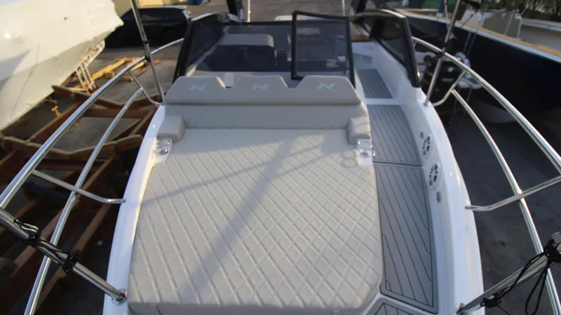 Yacht Photos Pics 2023 NX Boats 34 Sport Coupe with spacious sun deck and modern design.
