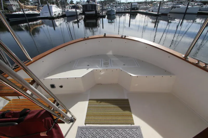 Adria Yacht Photos Pics Willard Marine 40 Flybridge Sedan Trawler, 2000, docked at marina with wooden accents.