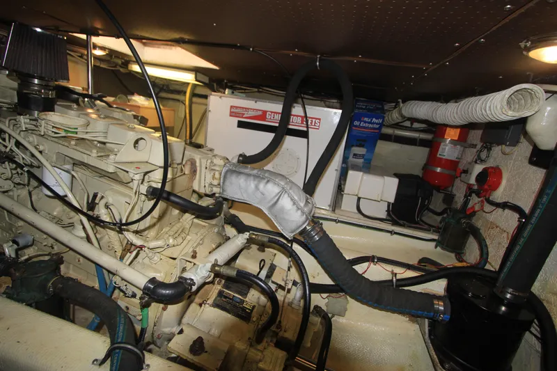 Adria Yacht Photos Pics Engine room of 2000 Willard Marine 40 Flybridge Sedan Trawler, showcasing machinery and equipment.