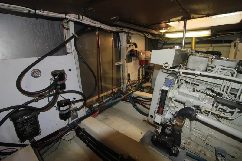 Adria Yacht Photos Pics Engine room of 2000 Willard Marine 40 Flybridge Sedan Trawler, showcasing mechanical components.