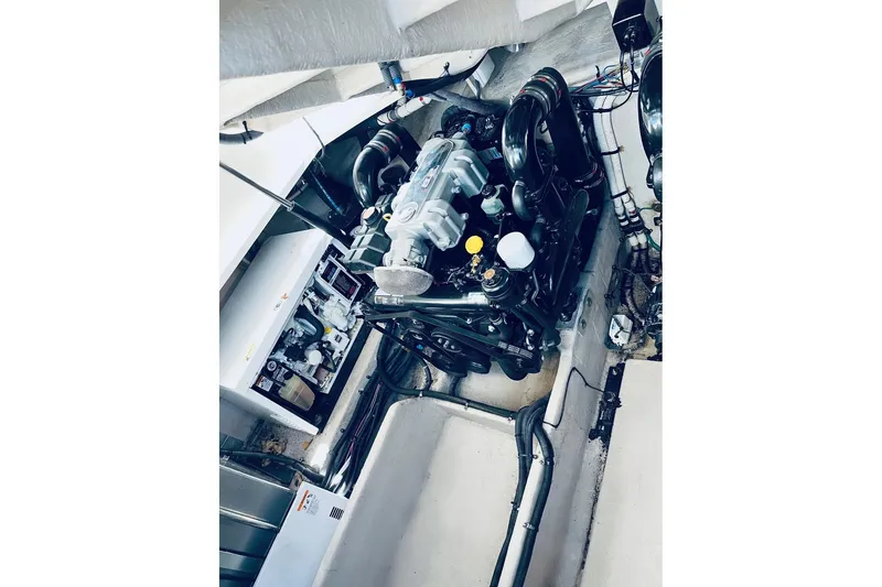  Yacht Photos Pics Engine room of 2012 Sea Ray 390 Sundancer, showcasing detailed mechanical components.