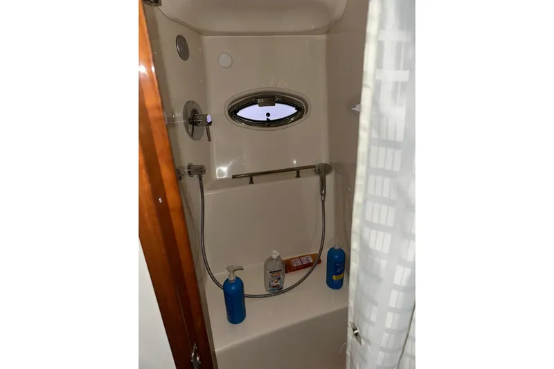  Yacht Photos Pics Shower area inside a 2012 Sea Ray 390 Sundancer yacht with toiletries.