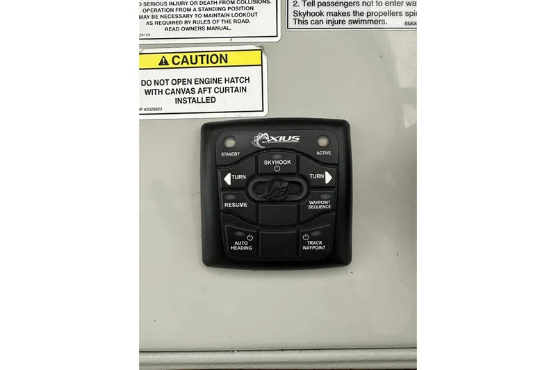  Yacht Photos Pics Control panel on a 2012 Sea Ray 390 Sundancer with caution labels.