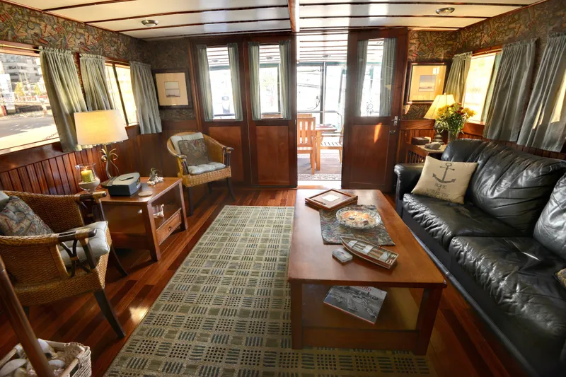 Boatel I Yacht Photos Pics Luxurious interior of a 1998 Custom 65 Foot Trawler with elegant furnishings and decor.