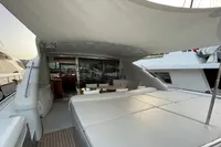 Luxury 2005 Pershing 76 yacht with spacious deck and modern design.