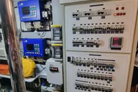 Electrical control panel in a 2005 Pershing 76 yacht engine room.