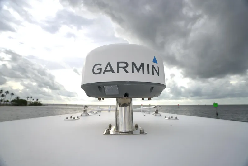  Yacht Photos Pics Garmin radar on 2012 Invincible 33 boat under cloudy sky.