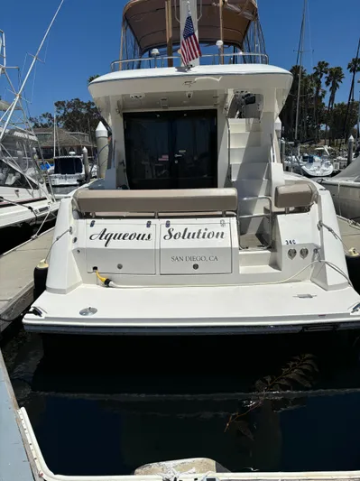  Yacht Photos Pics 2014 Carver C34 yacht docked in San Diego marina, rear view.