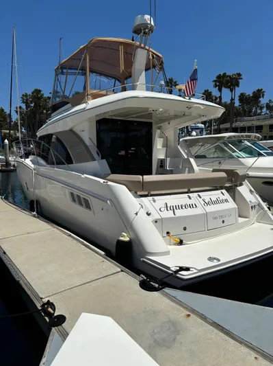  Yacht Photos Pics 2014 Carver C34 yacht docked at marina under clear blue sky.