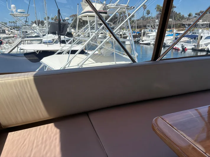  Yacht Photos Pics Interior view of 2014 Carver C34 yacht with marina background.