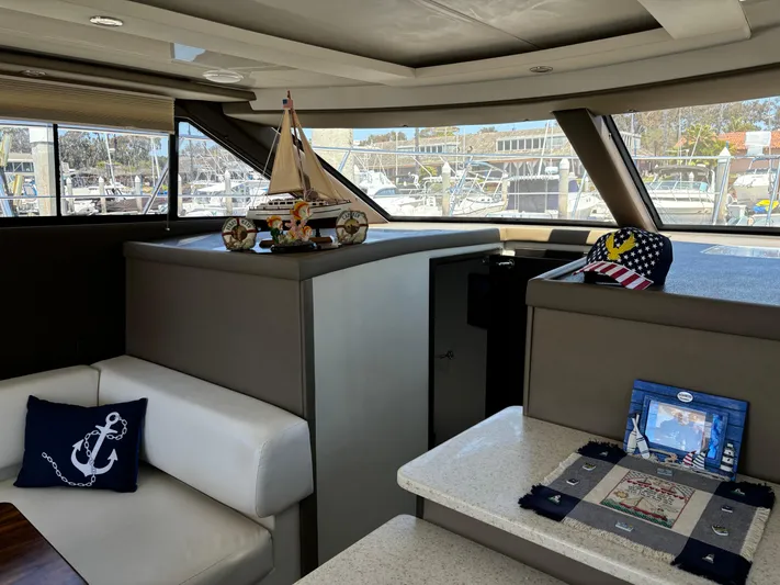  Yacht Photos Pics Interior of 2014 Carver C34 yacht with nautical decor and marina view.