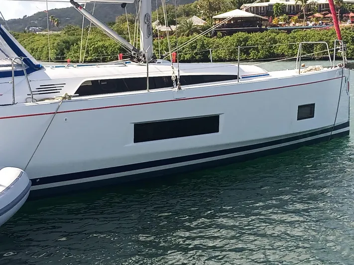 Blue Tide Yacht Photos Pics 2020 Beneteau Oceanis 46.1 sailboat docked in scenic marina.