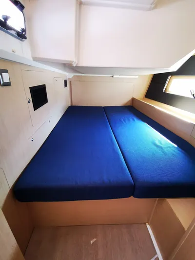 Blue Tide Yacht Photos Pics Interior cabin of 2020 Beneteau Oceanis 46.1 with blue bedding.