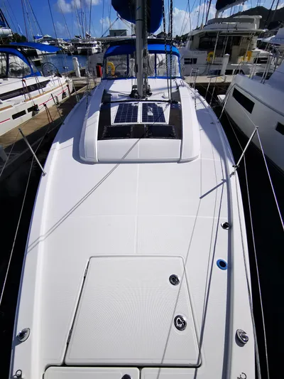 Blue Tide Yacht Photos Pics 2020 Beneteau Oceanis 46.1 sailboat deck with solar panels in marina.