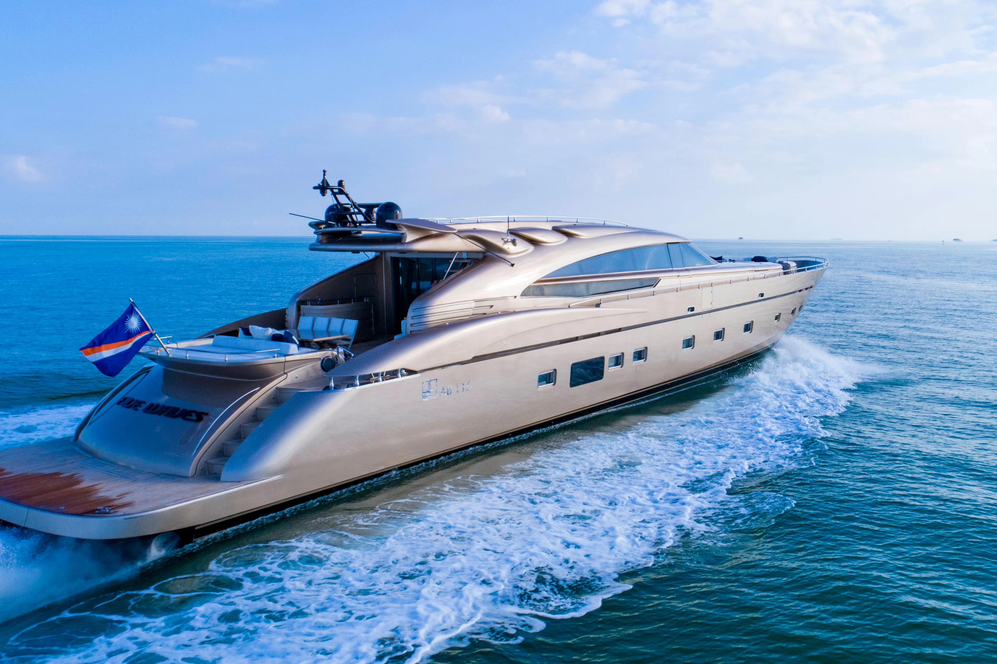 Luxurious AB 118 yacht cruising on open sea, 2010 model.