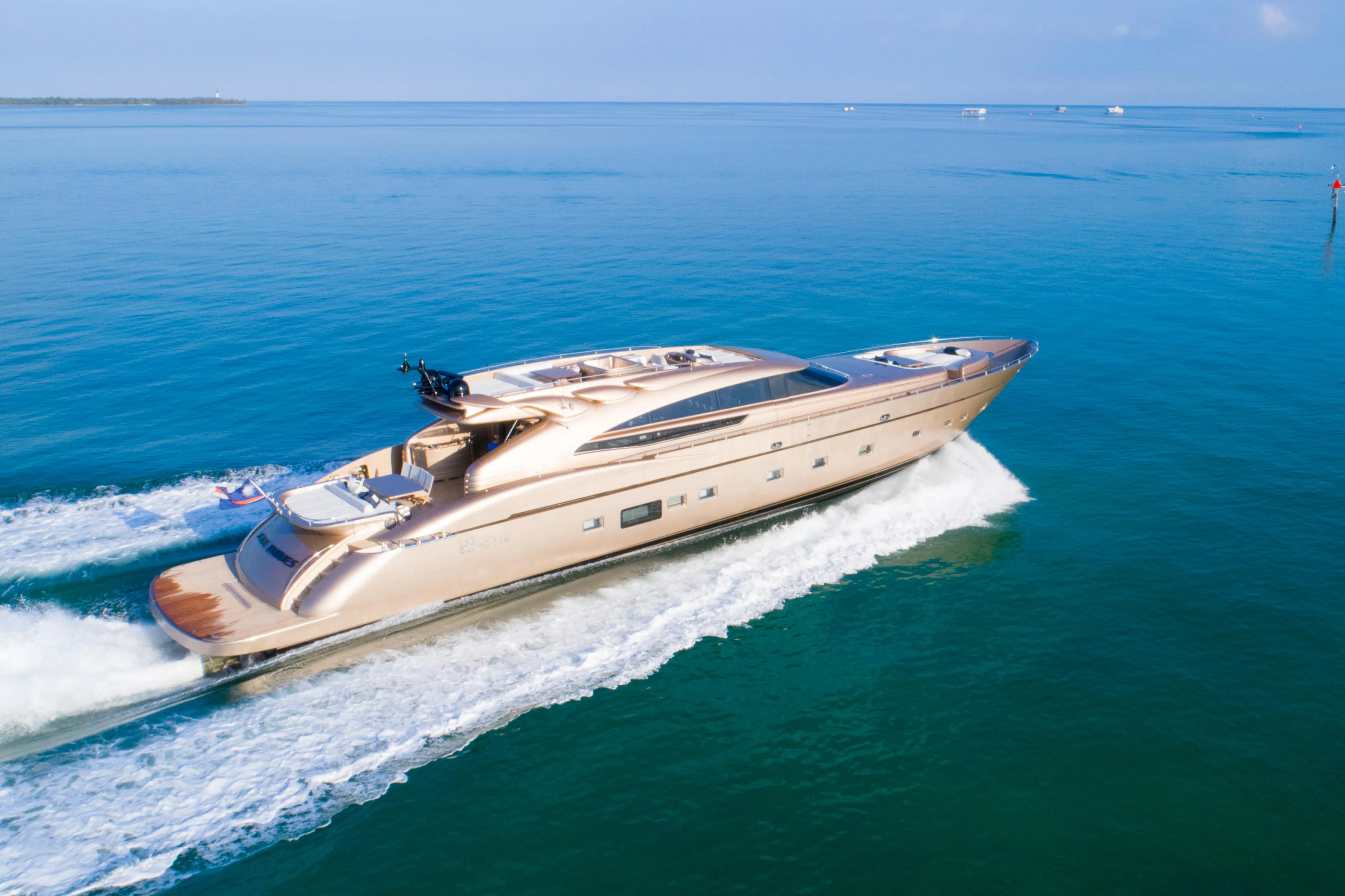 Luxurious AB 118 yacht cruising on open sea, 2010 model, clear blue water.