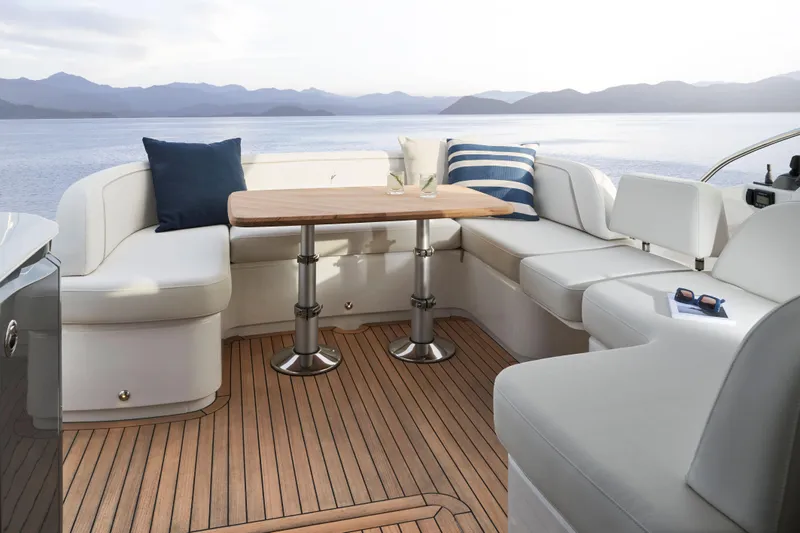 50 Princess V50 2026 Yacht Photos Pics Luxurious 2026 Princess V50 Deck Salon yacht with elegant seating and scenic ocean view.