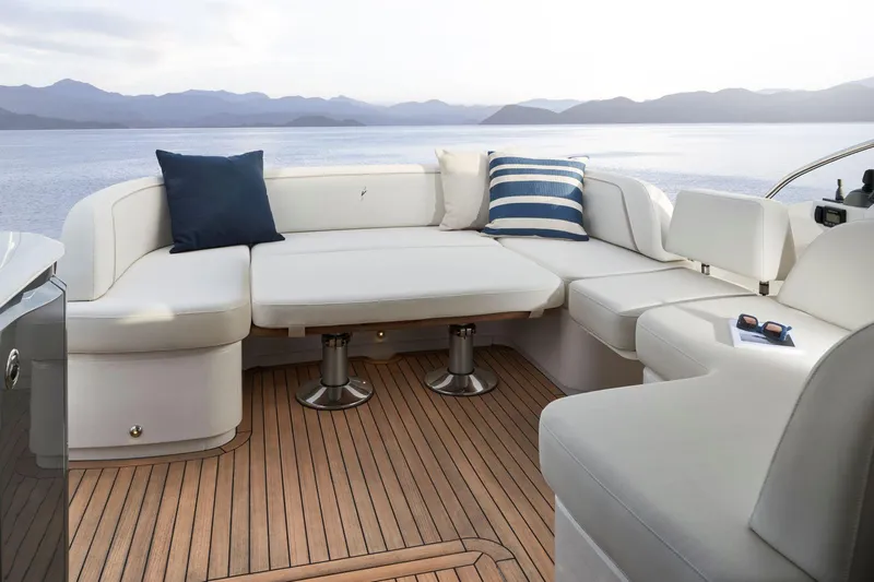 50 Princess V50 2026 Yacht Photos Pics Luxurious 2026 Princess V50 Deck Salon yacht with elegant seating and scenic ocean view.