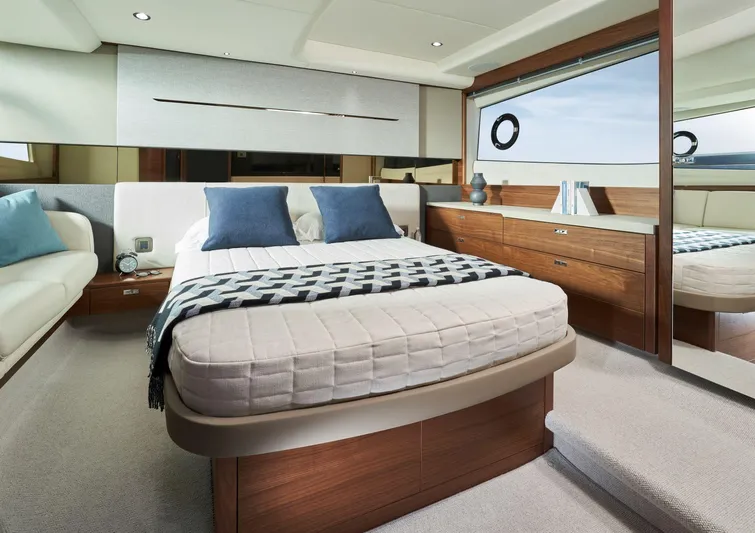 50 Princess V50 2026 Yacht Photos Pics Luxurious bedroom interior of 2026 Princess V50 Deck Salon yacht with modern design.