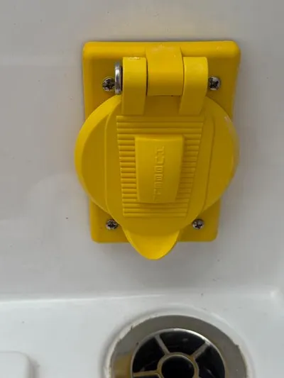  Yacht Photos Pics Yellow outlet cover on 2023 Southport 33 DC boat.