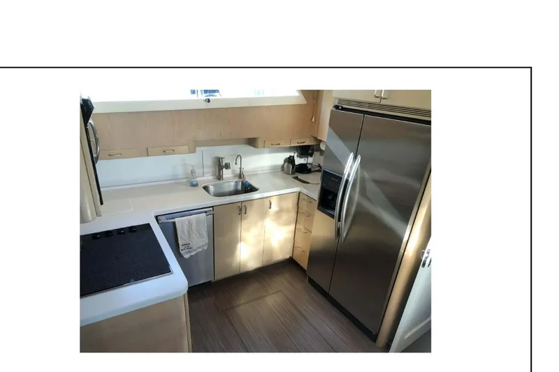 "focus" Yacht Photos Pics 1977 Hatteras 58 Yacht Fisherman kitchen with modern appliances and sleek design.