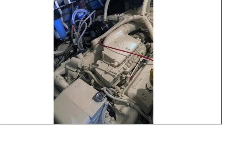 "focus" Yacht Photos Pics Engine room of a 1977 Hatteras 58 Yacht Fisherman with visible components and wiring.